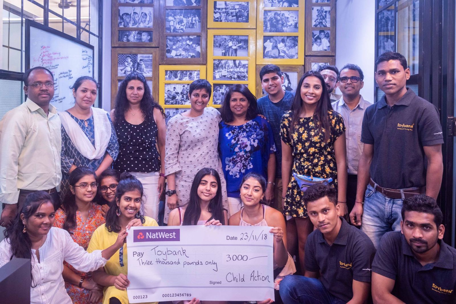 The youth ambassadors, Seema and the Toybank team presenting a £3,000 cheque in Toybank's Mumbai office
