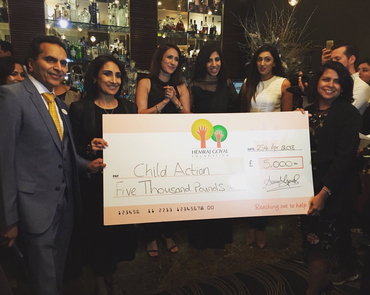 The Hemraj Goyal Foundation presenting a £5,000 cheque to Child Action